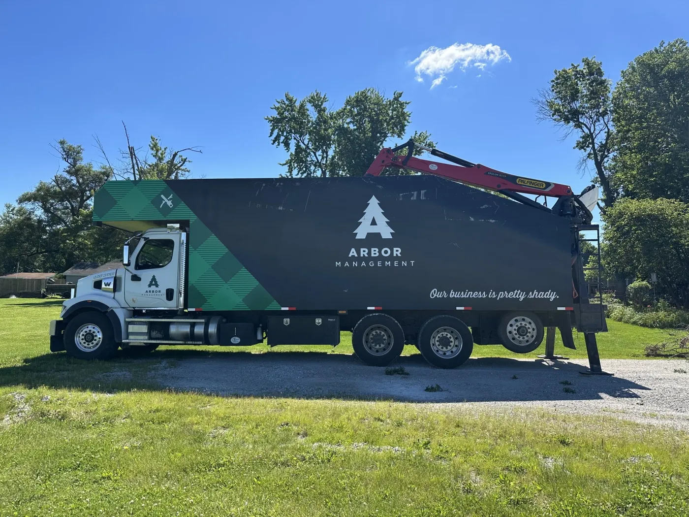 Arbor Management — Professional Tree Services in the Metro East Arbor Management tree service crew and equipment